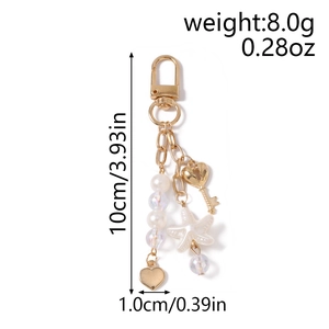 Detailed view of beaded heart and starfish keychain with weight and size dimensions