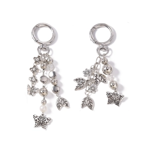 Vintage silver beaded keychain with metal butterfly, leaf charms and white pearl accent