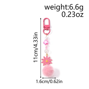 Porte-clés rose avec pompon en peluche, perles et fleurs pour décoration de sac
