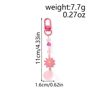 Porte-clés à perles roses avec breloque fleur de marguerite et dimensions détaillées