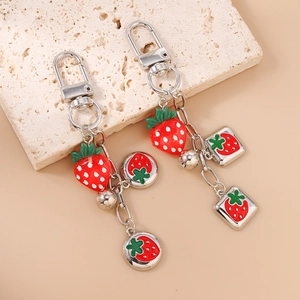 Fashionable strawberry keychain pendants with silver metal clasps and square charms