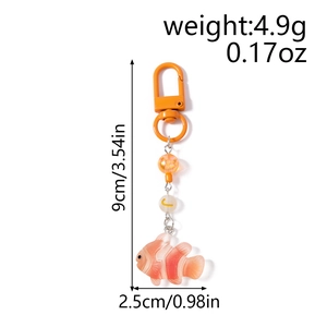 Size chart showing a 9cm tall orange clownfish beaded keychain with weight specifications