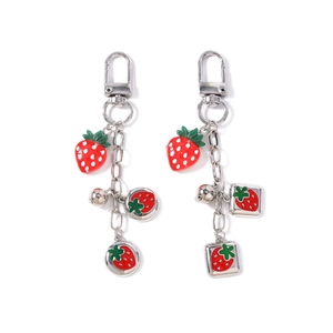 Fashionable strawberry keychain set with red metal charms and bells for bag decoration