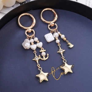Porte-clés doré avec ancre et perles avec pendentifs étoiles pour décoration de sac