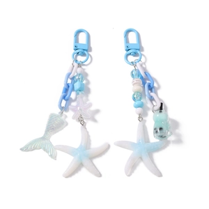 Blue ocean-themed beaded keychain with fishtail and starfish charms on a white background