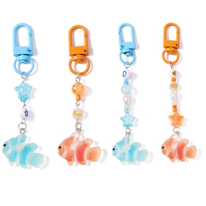 Set of 4 beaded goldfish keychains with colorful stars and plastic lobster clasps