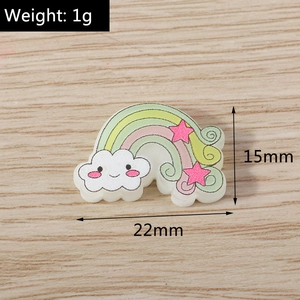 Detailed macro view of small 1g rainbow cloud resin pendant with precise 22mm measurements