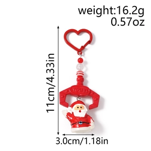 Detailed view of Santa Claus claw keychain showing dimensions 11cm and weight 16.2g