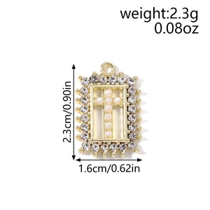 Gold rectangular pendant with pearl cross and crystal bezel, 2.3cm by 1.6cm size