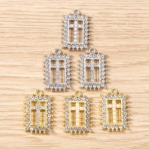 Geometric cross pendants with pearls and crystals in gold and silver plating
