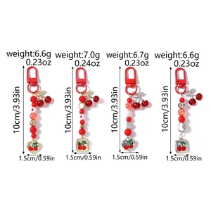 Detailed view of beaded cherry keychains with dimensions and weight specifications