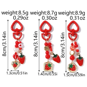 Detailed size and weight specs for strawberry beaded keychains with red heart clasps