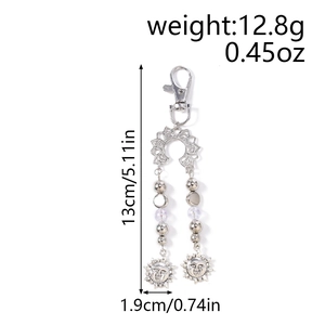 Détails du porte-clés soleil en argent avec perles et dimensions précises du produit