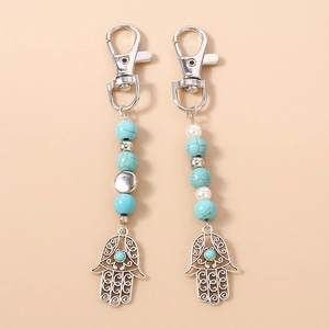 Bohemian Hamsa-Hand Künstliche Perlen Schlüsselanhänger Mit Türkis Künstliche Perlenimitat Legierung Ajouré Evil Eye Schutz Tasche Anhänger Damen