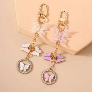 Fashionable beaded butterfly keychains with rhinestones and gold rings for bags