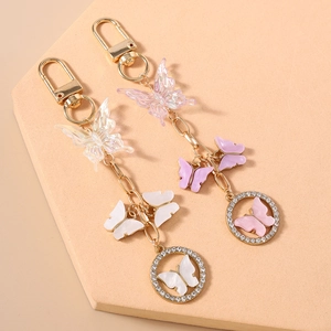 Fashionable beaded butterfly keychain set with gold chain and rhinestone charms