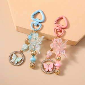 Porte-clés papillon perlé à la mode avec anneau en strass et pendentif crochet en cœur