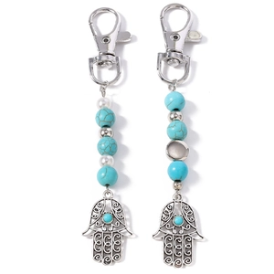 Hamsa Hand Schlüsselanhänger Set mit türkisfarbenen Perlen und Karabinerverschluss