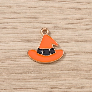 Detailed view of orange witch hat charms with gold accents for DIY jewelry projects
