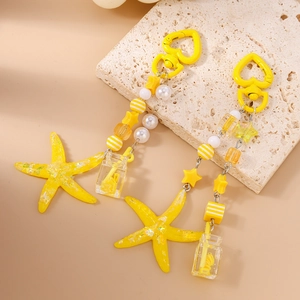 Fashionable yellow starfish keychain with star beads and ocean-themed charms for handbags