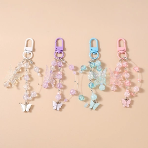 Schicke Schmetterling-Perlen Schlüsselanhänger in Weiß, Lila, Blau und Rosa für Taschen