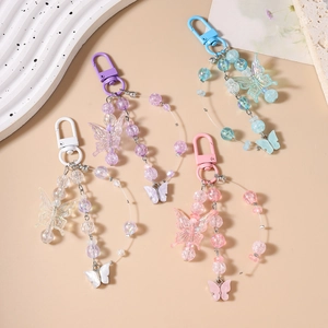 Schicke Schmetterlings-Perlen-Schlüsselanhänger in Lila, Blau, Weiß und Rosa