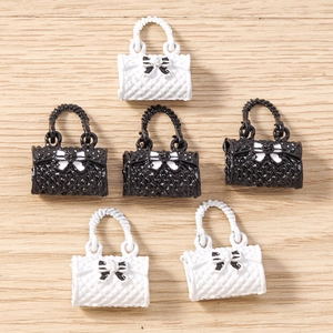Quilted mini handbag pendants with bow detail for DIY jewelry making and crafts