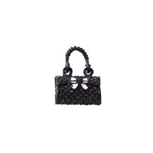 Elegant black quilted mini handbag charm pendant with bow detail for accessories
