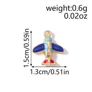 Detailed view of mini airplane charms with colorful enamel for DIY jewelry making