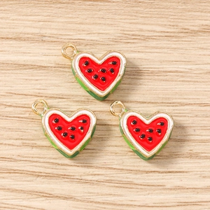 Three heart-shaped watermelon alloy charms with golden edges for DIY jewelry making