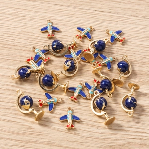 Enamel alloy airplane and globe charms for DIY jewelry making in gold and blue finish