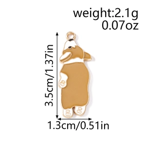 Detail view of yellow Corgi enamel pendant showing size 3.5cm by 1.3cm and 2.1g weight