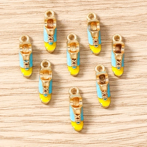 Blue and yellow alloy sneaker charms for DIY jewelry making with gold-plated finish