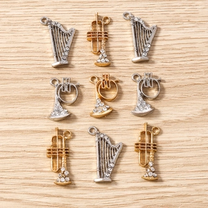 Pendentifs instruments de musique dorés et argentés avec strass pour création bijoux DIY