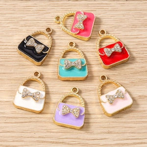 Set of colorful enamel handbag charms with crystal bows for DIY jewelry and necklaces