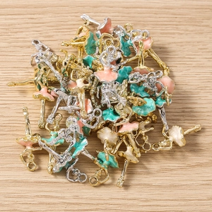 Detailed flat lay of colorful enamel ballet girl pendants for DIY jewelry making