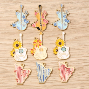 Colorful enamel musical instrument pendants including violin guitar and harp charms