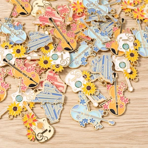 Musical instrument pendants with floral enamel designs for DIY jewelry making