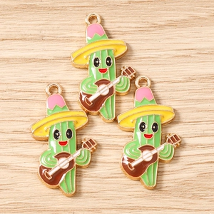 Detailed macro view of 3D cactus charms with sombreros and guitars for DIY jewelry making