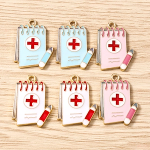 Notebook charms with red cross and pencil in alloy drip oil for DIY jewelry making
