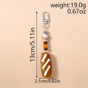 Creative bread baguette keychain with beads and silver metal clasp showing dimensions