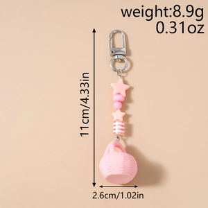 Pink beaded keychain with star charm and basket pendant showing 11cm length dimensions