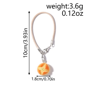 Detail showing donut bread charm dimensions with cord length and weight specifications