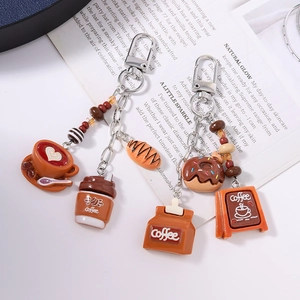 Creative coffee and pastry keychain set with miniature donuts and croissants charms