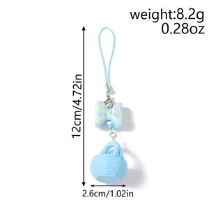 Porte-clés avec nœud bleu et panier macaron, incluant les dimensions et le poids précis