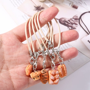 Detailed set of five miniature pastry charms with woven cords and silver metal lobster clasps