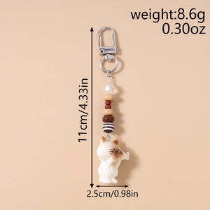 Detail view of cat beaded keychain showing dimensions 11cm length and 8.6g weight
