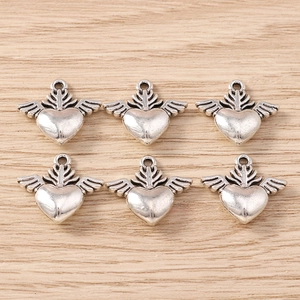 Set of six heart-shaped pendants with wings for DIY jewelry making and crafts