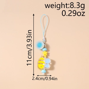 Detailed view of bee charm phone strap with yellow star and blue beads, 11cm length