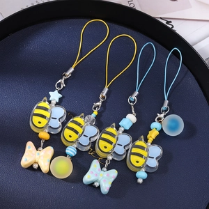 Cartoon bee phone charms set with yellow acrylic beads and blue heart wings